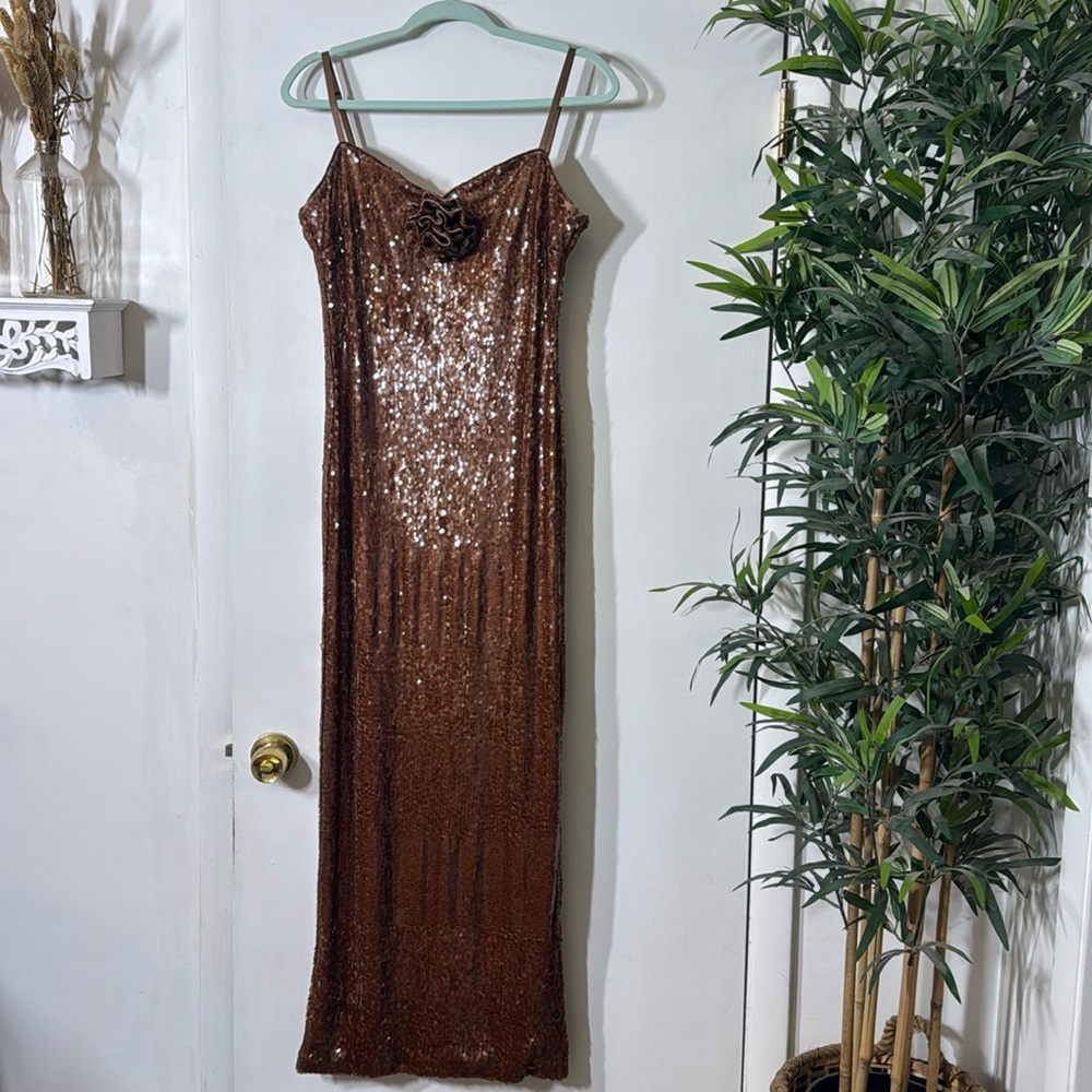 French connection sequin gown with rosette detail. Adjustable straps